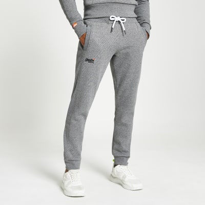 grey and orange joggers