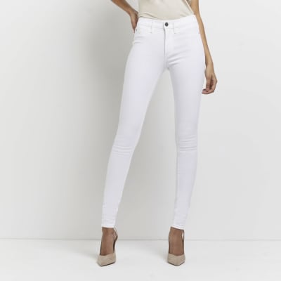 Tall white molly mid rise super skinny jeans | River Island