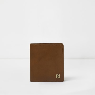 Tan brown trifold leather wallet