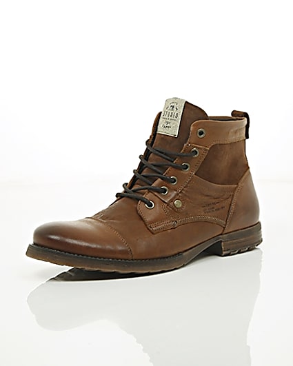 360 degree animation of product Tan leather and suede toe cap work boots frame-0