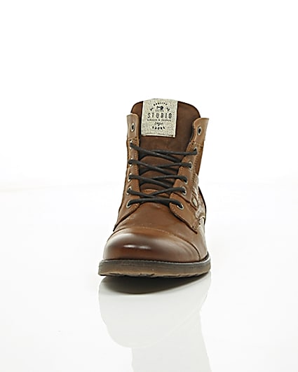 360 degree animation of product Tan leather and suede toe cap work boots frame-3