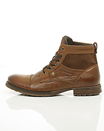 360 degree animation of product Tan leather and suede toe cap work boots frame-21