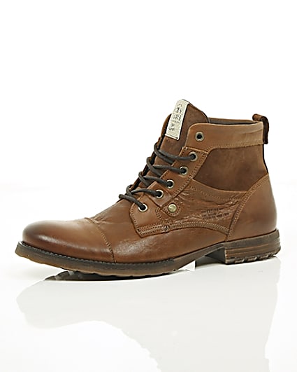 360 degree animation of product Tan leather and suede toe cap work boots frame-23