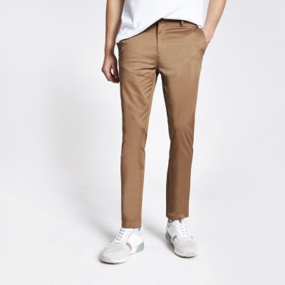 Tan skinny fit chino trousers | River Island