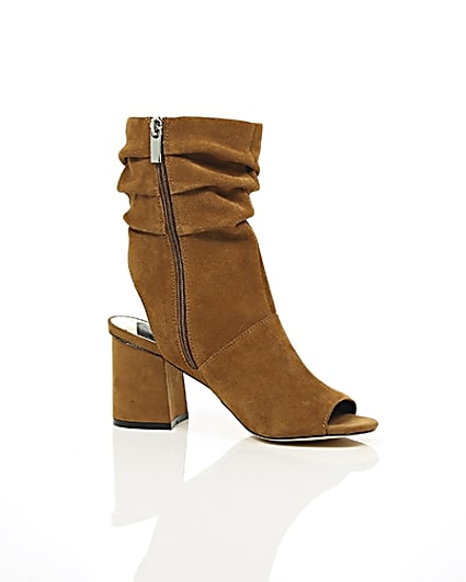 360 degree animation of product Tan suede slouch shoe boots frame-8