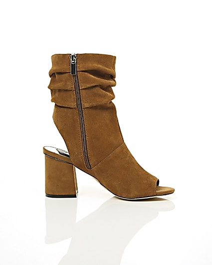 360 degree animation of product Tan suede slouch shoe boots frame-9