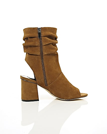 360 degree animation of product Tan suede slouch shoe boots frame-10