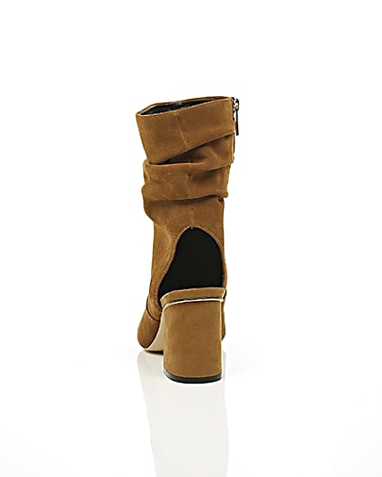 360 degree animation of product Tan suede slouch shoe boots frame-16