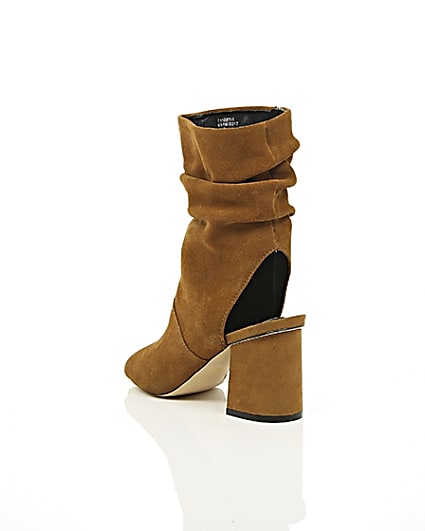 360 degree animation of product Tan suede slouch shoe boots frame-18