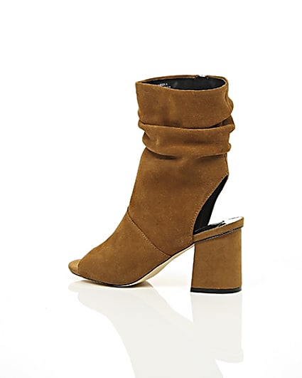 360 degree animation of product Tan suede slouch shoe boots frame-20