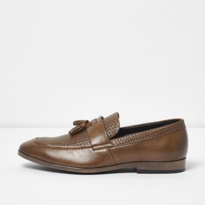 Tan tassel woven loafers