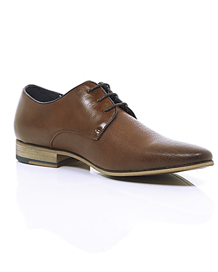 360 degree animation of product Tan textured lace-up formal shoes frame-7