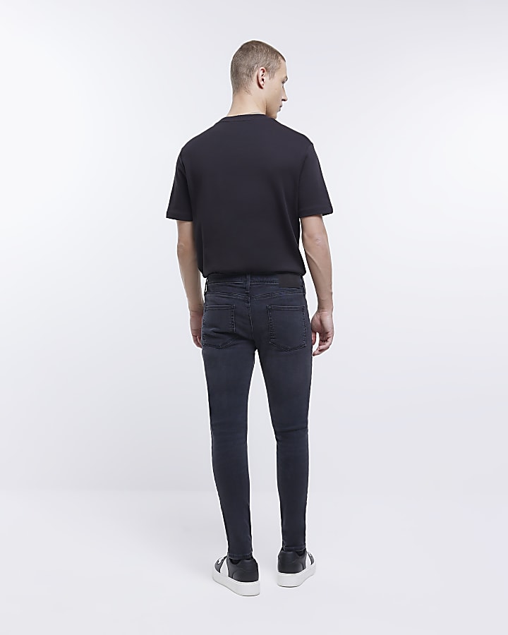 Washed black spray on skinny fit jeans