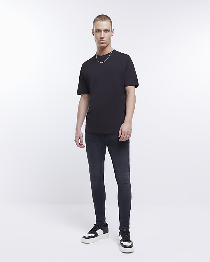 Washed black spray on skinny fit jeans