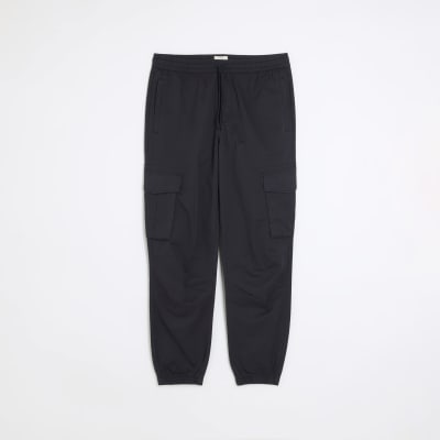 Washed navy slim fit cargo joggers River Island