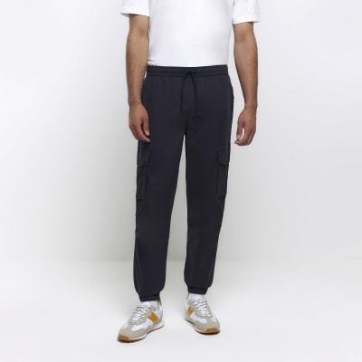 Washed navy slim fit cargo joggers | River Island