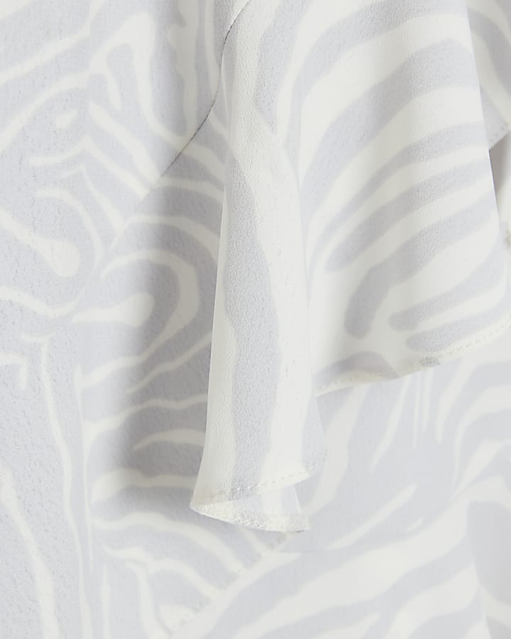 White animal print frill wrap playsuit