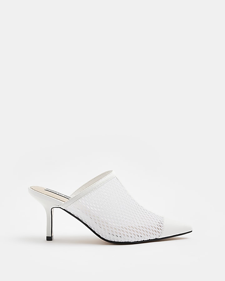 White backless heeled court shoes