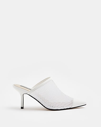 White backless heeled court shoes