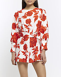 White belted floral long sleeve playsuit