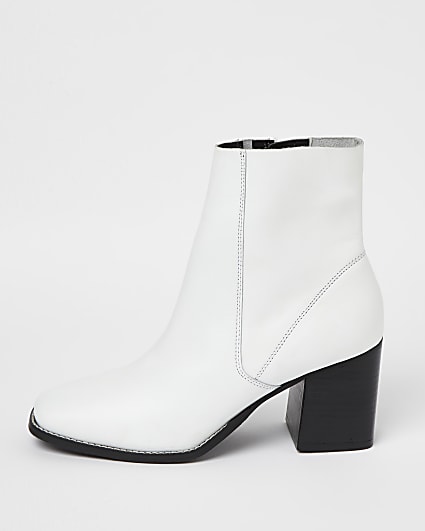 White block heeled boots