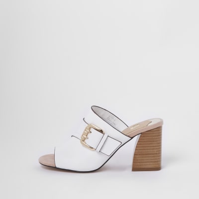 White buckle block heel mules
