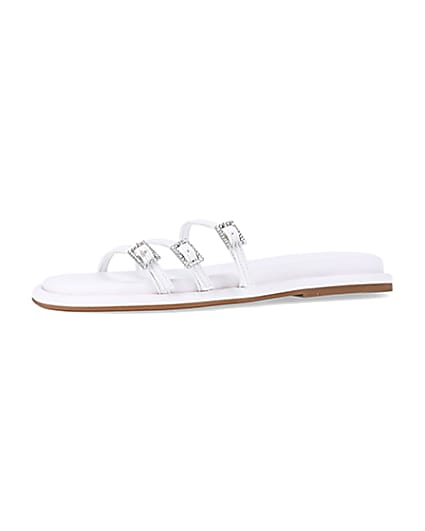 360 degree animation of product White buckle detail flat sandals frame-2