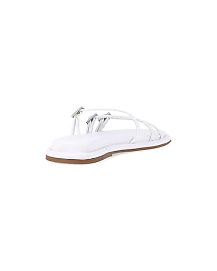 360 degree animation of product White buckle detail flat sandals frame-11