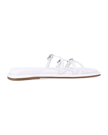360 degree animation of product White buckle detail flat sandals frame-14