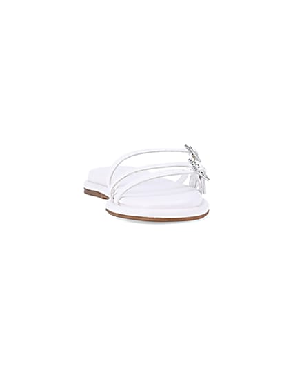 360 degree animation of product White buckle detail flat sandals frame-20