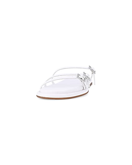 360 degree animation of product White buckle detail flat sandals frame-22
