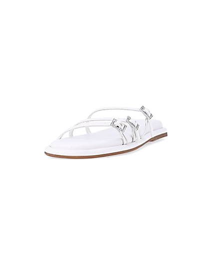 360 degree animation of product White buckle detail flat sandals frame-23