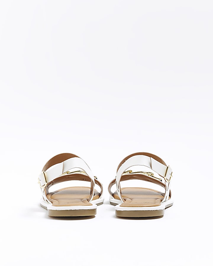 White buckle flat sandals