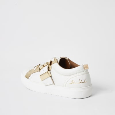 White buckle strap lace-up trainers