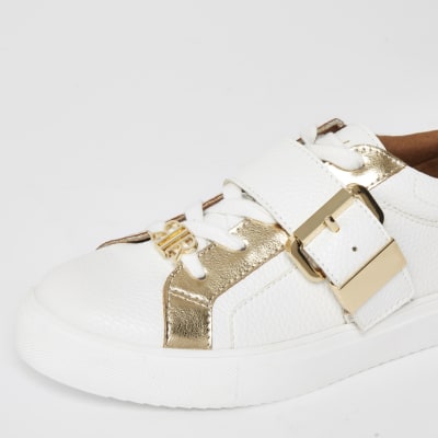 White buckle strap lace-up trainers