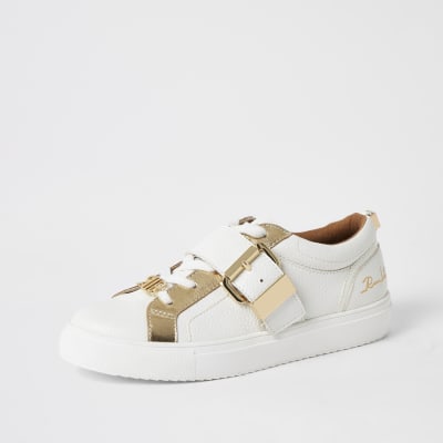 White buckle strap lace-up trainers