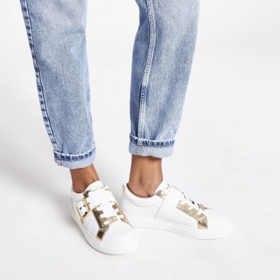 White buckle strap lace-up trainers