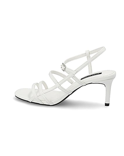 360 degree animation of product White caged skinny heel sandals frame-4