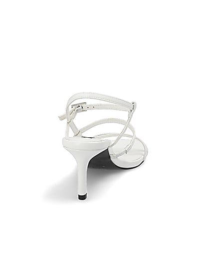 360 degree animation of product White caged skinny heel sandals frame-10