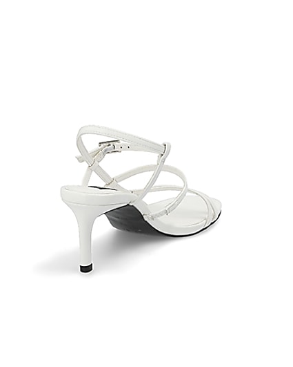 360 degree animation of product White caged skinny heel sandals frame-11