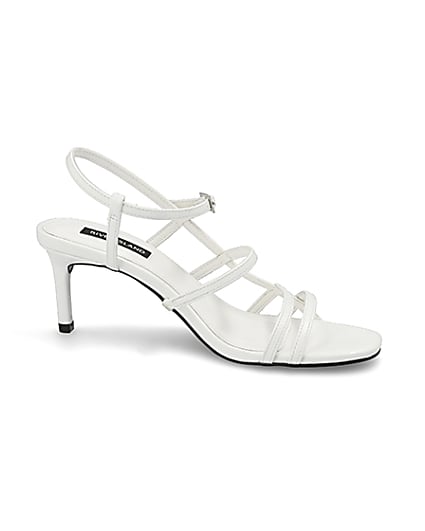 360 degree animation of product White caged skinny heel sandals frame-16