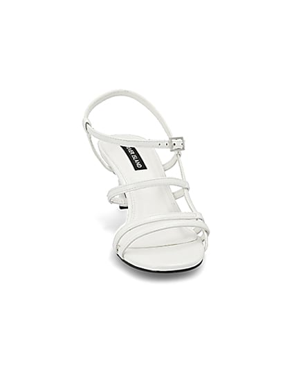 360 degree animation of product White caged skinny heel sandals frame-20