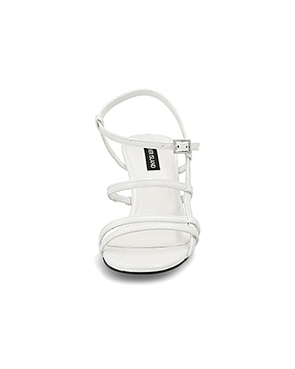 360 degree animation of product White caged skinny heel sandals frame-21