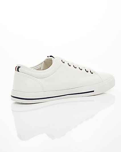 360 degree animation of product White canvas lace-up plimsolls frame-12