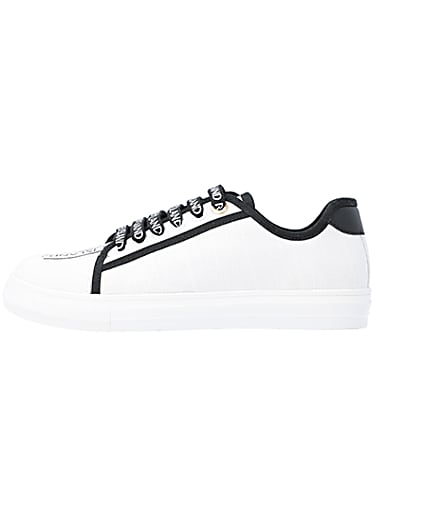 360 degree animation of product White canvas plimsoll trainers frame-3
