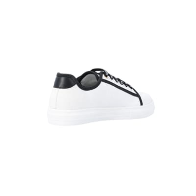 360 degree animation of product White canvas plimsoll trainers frame-12