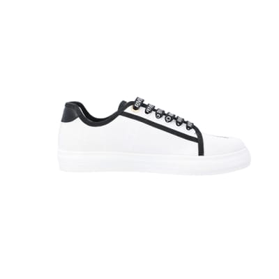 360 degree animation of product White canvas plimsoll trainers frame-15
