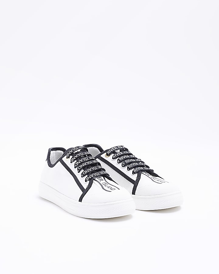 White canvas plimsoll trainers