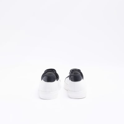 White canvas plimsoll trainers