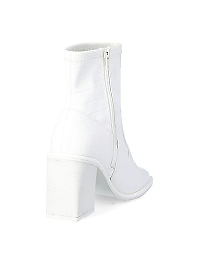 360 degree animation of product White croc embossed heeled ankle boots frame-11